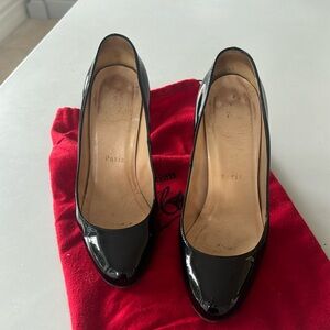 Christian Loubotin patent leather black pumps
